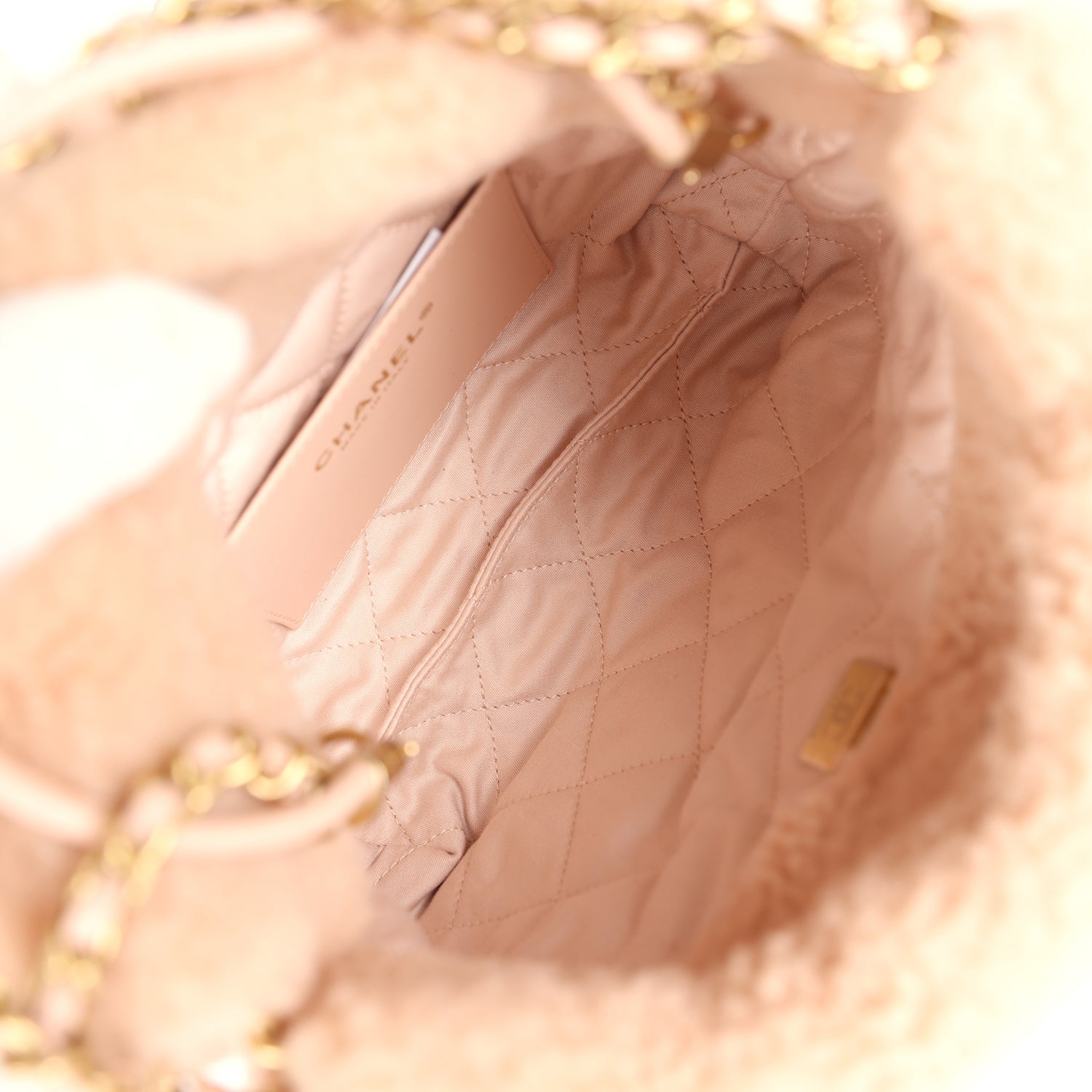chanel-mini-22-bag-light-pink-shearling-gold-metal
