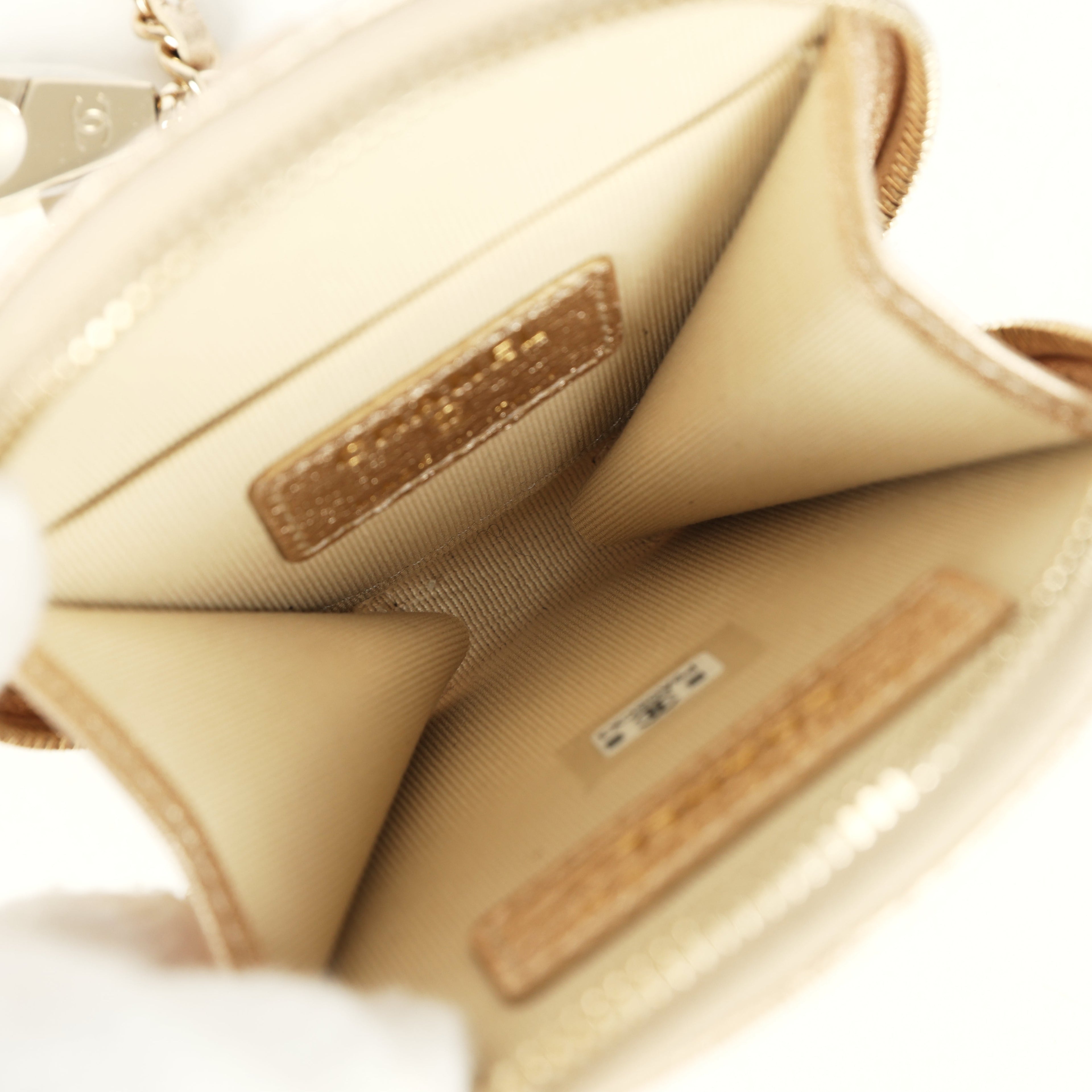chanel-round-clip-on-coin-purse-and-airpod-pro-case-metallic-gold-goatskin-light-gold-metal-1