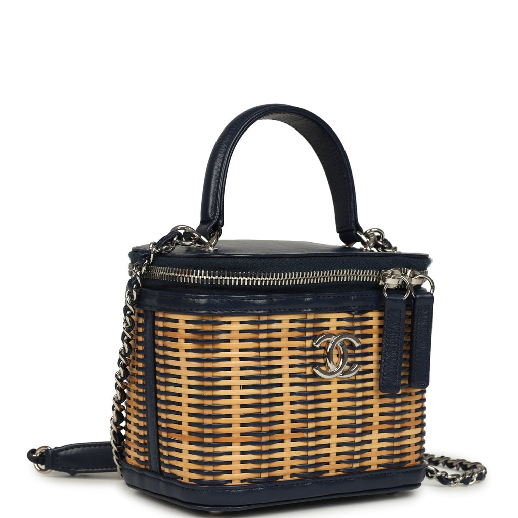 pre-owned-chanel-small-top-handle-vanity-case-beige-raffia-and-navy-calfskin-silver-metal