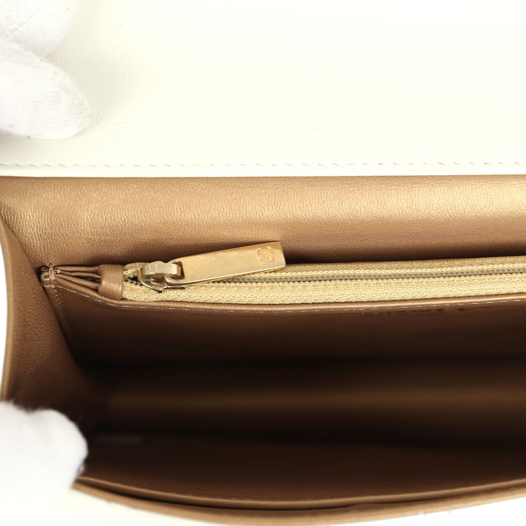 preowned-chanel-small-chic-pearls-flap-bag-white-calfskin-antique-gold-metal