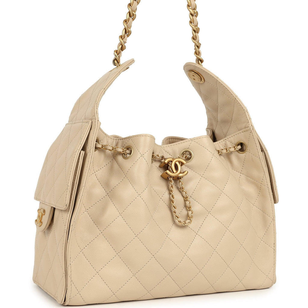 pre-owned-chanel-small-25-hobo-bag-beige-caviar-antique-gold-metal