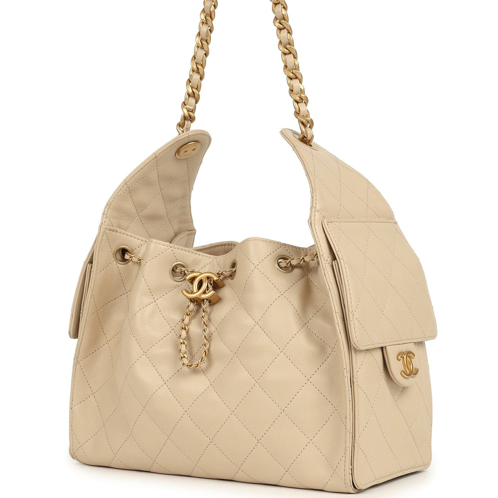 pre-owned-chanel-small-25-hobo-bag-beige-caviar-antique-gold-metal