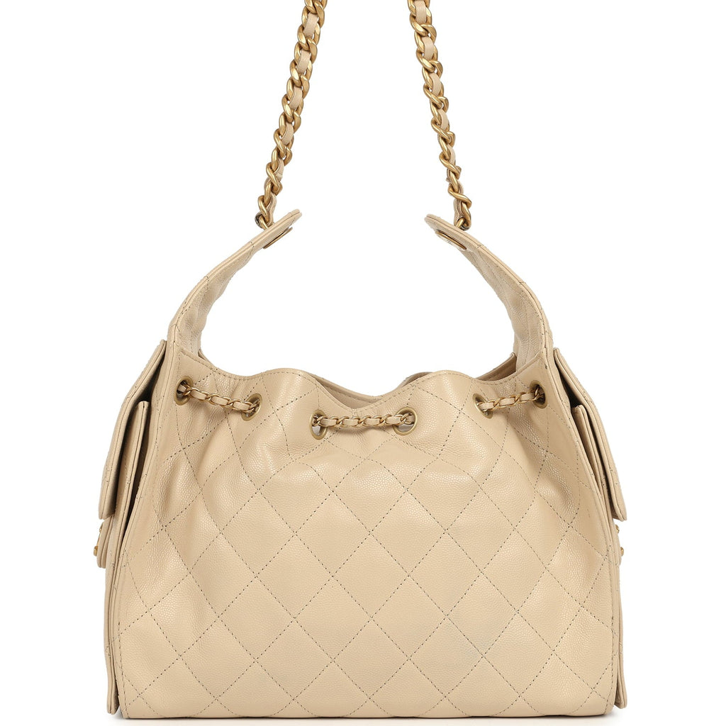 pre-owned-chanel-small-25-hobo-bag-beige-caviar-antique-gold-metal