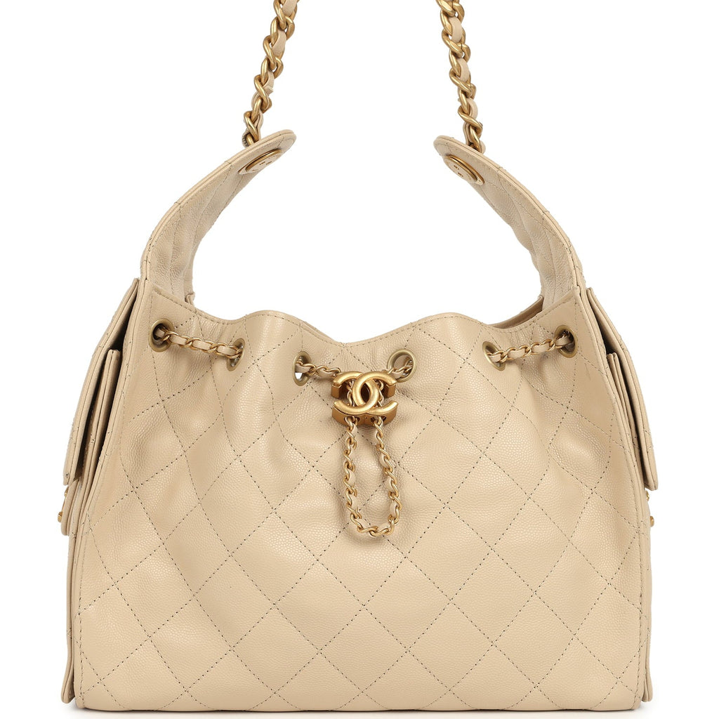 pre-owned-chanel-small-25-hobo-bag-beige-caviar-antique-gold-metal