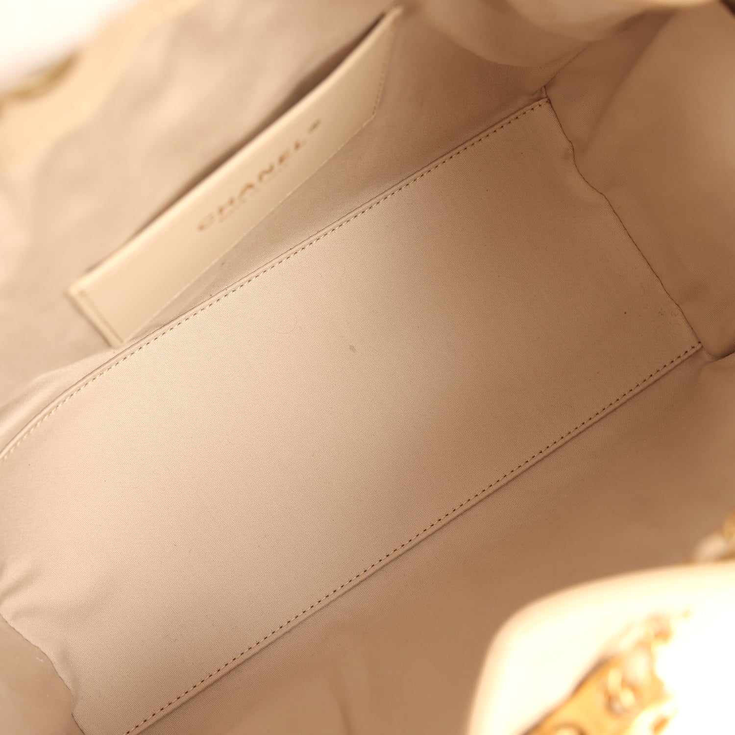 pre-owned-chanel-small-25-hobo-bag-beige-caviar-antique-gold-metal