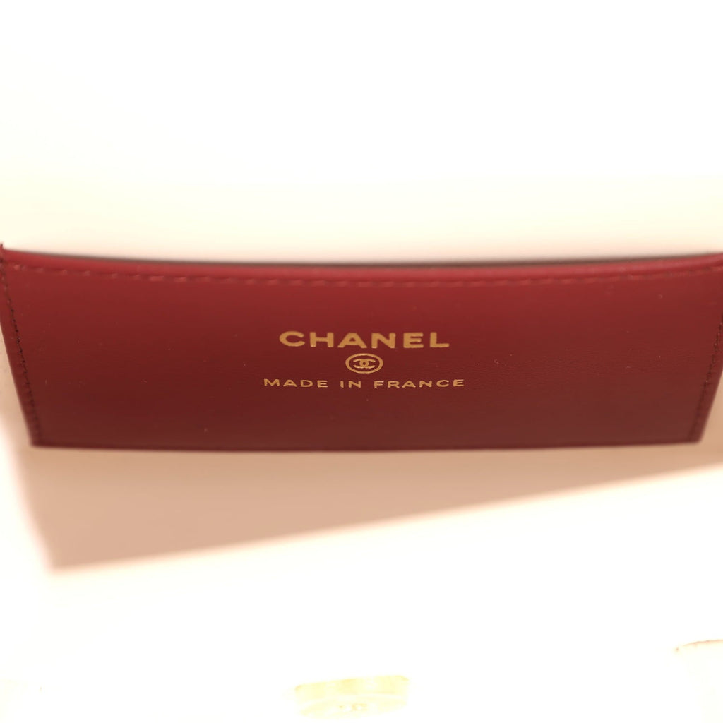 chanel-mini-preppy-coco-clutch-with-straps-white-shiny-caviar-brushed-gold-metal-2