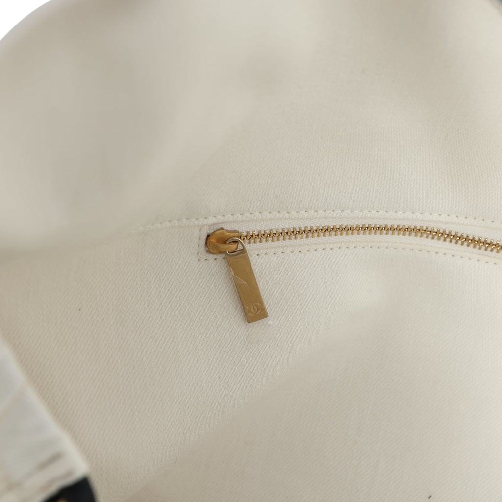 chanel-maxi-coco-beach-cambon-hobo-bag-white-denim-and-black-calfskin-brushed-gold-metal