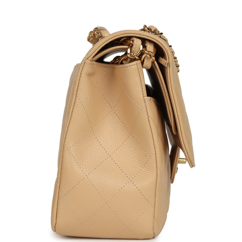 pre-owned-chanel-jumbo-classic-double-flap-bag-light-beige-caviar-gold-metal-2