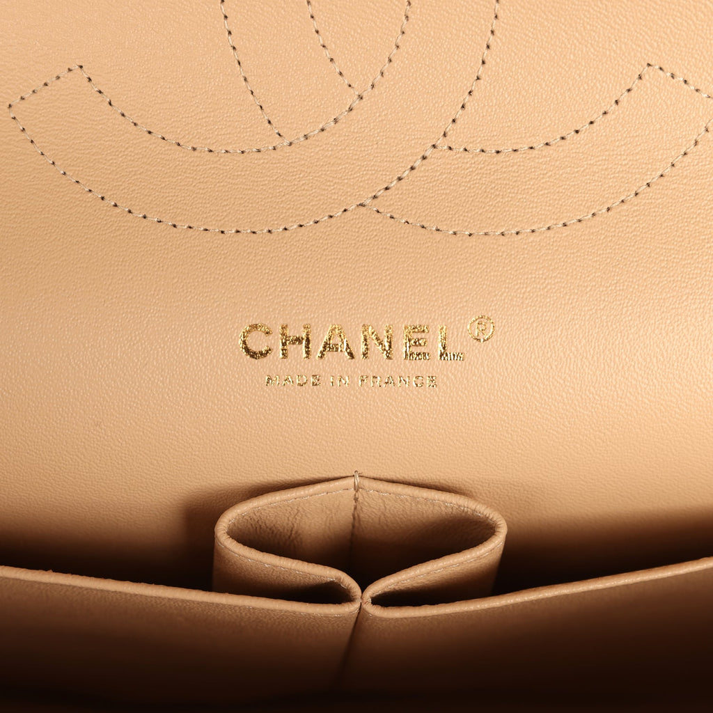 pre-owned-chanel-jumbo-classic-double-flap-bag-light-beige-caviar-gold-metal-2