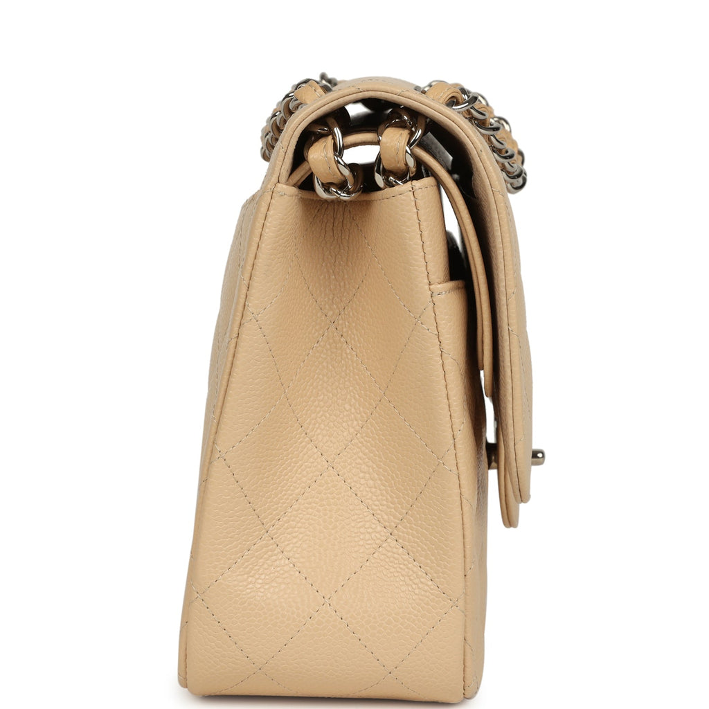 pre-owned-chanel-jumbo-classic-double-flap-bag-light-beige-caviar-silver-metal-1