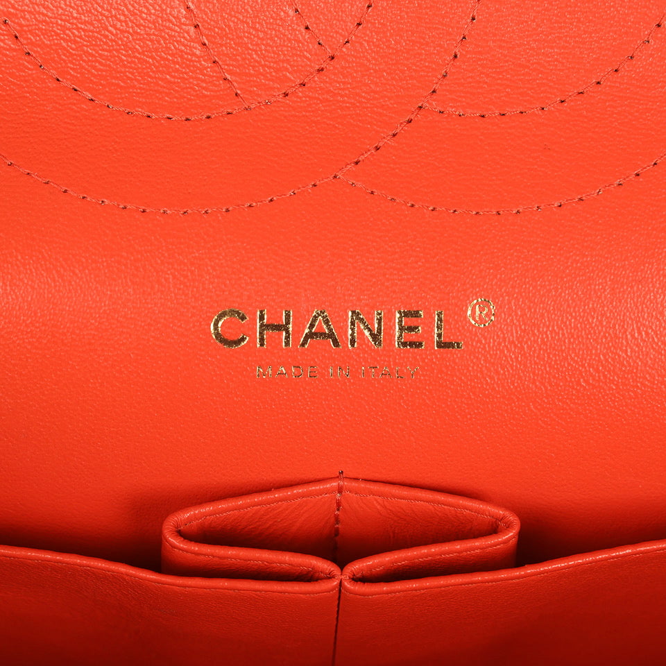 pre-owned-chanel-jumbo-classic-double-flap-bag-dark-orange-shiny-caviar-light-gold-metal