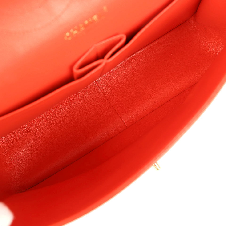 pre-owned-chanel-jumbo-classic-double-flap-bag-dark-orange-shiny-caviar-light-gold-metal