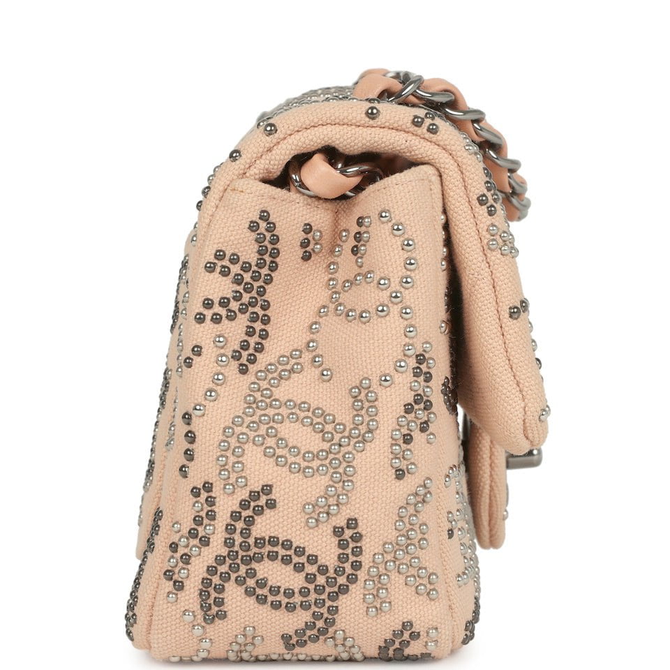pre-owned-chanel-mini-cc-studded-rectangular-flap-bag-light-pink-canvas-ruthenium-metal