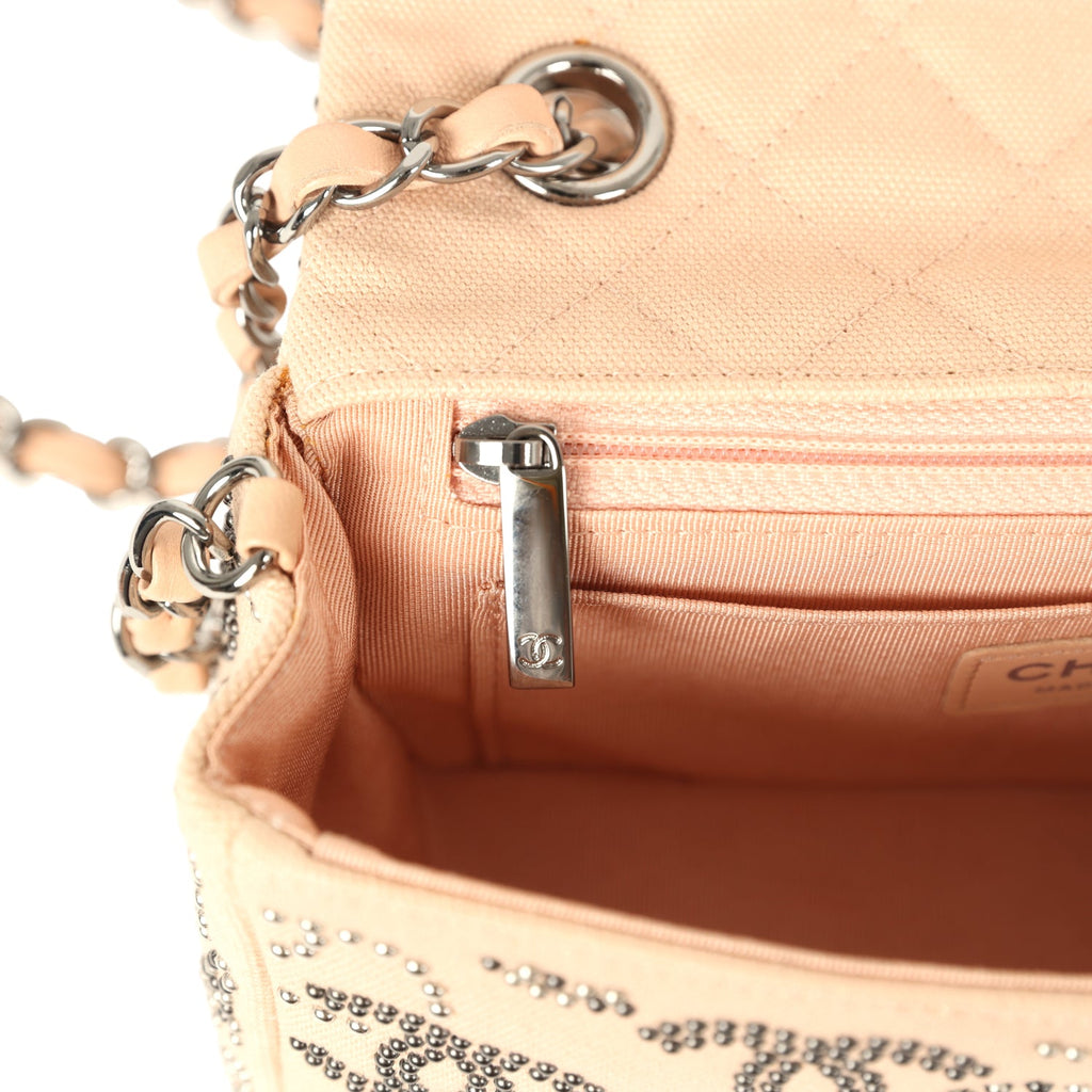 pre-owned-chanel-mini-cc-studded-rectangular-flap-bag-light-pink-canvas-ruthenium-metal