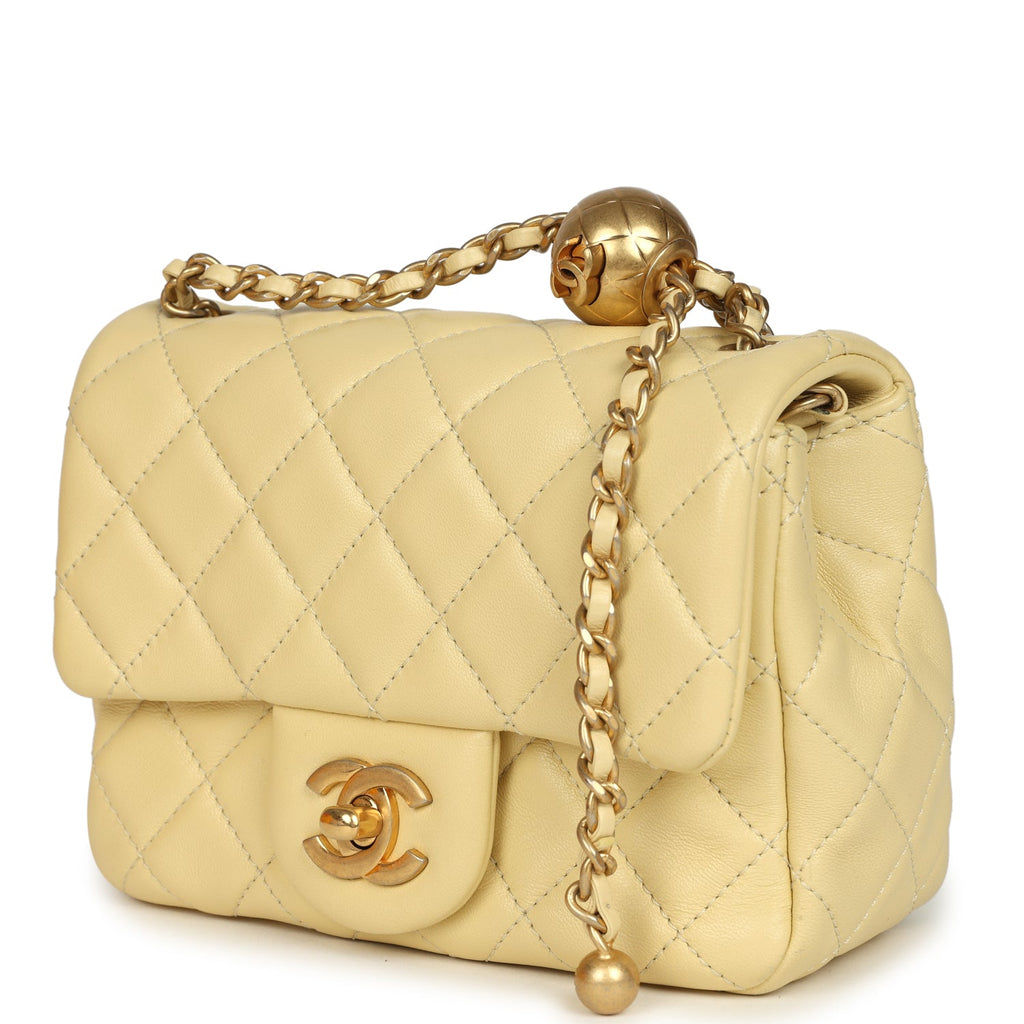 pre-owned-chanel-mini-pearl-crush-square-flap-bag-yellow-lambskin-brushed-gold-metal
