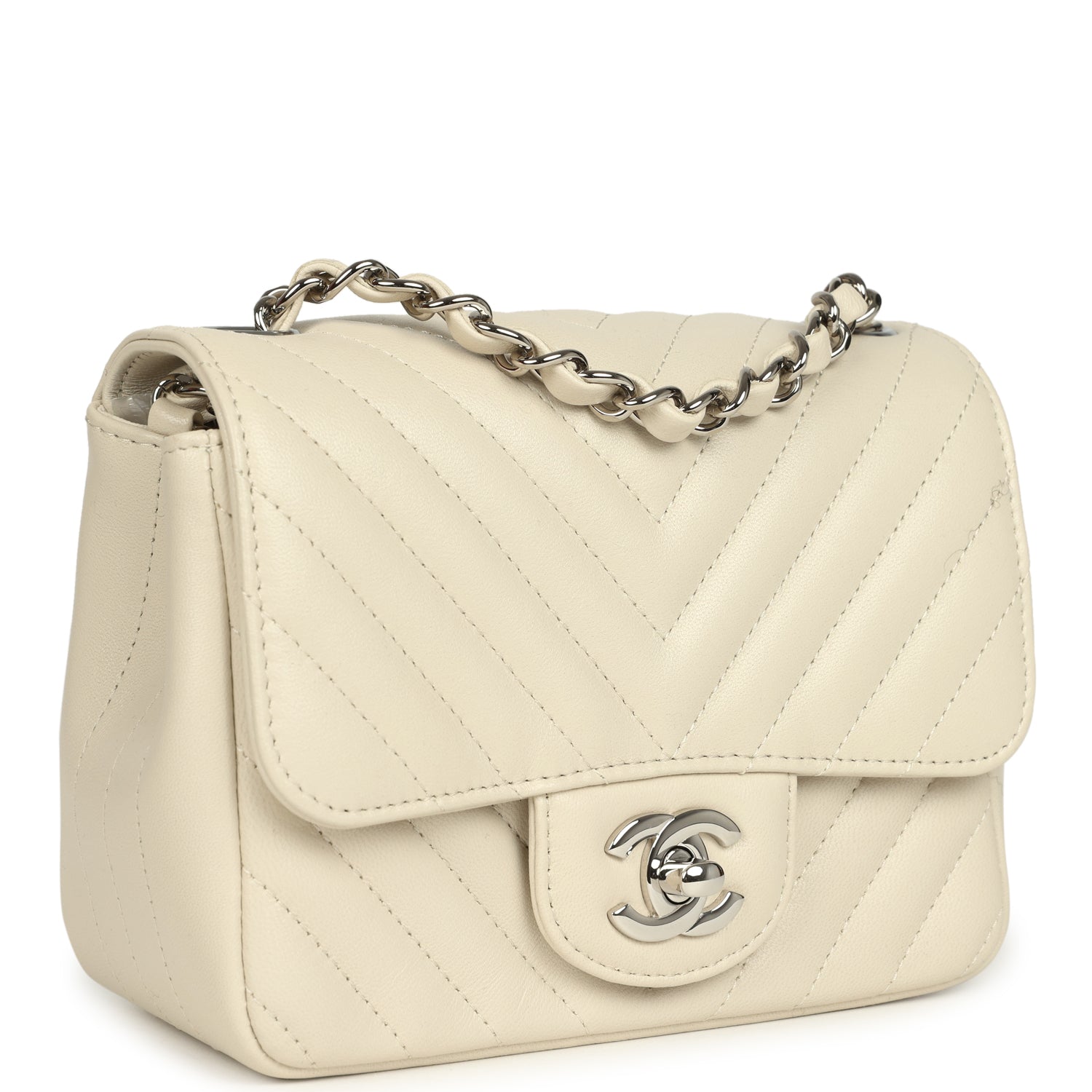 pre-owned-chanel-mini-chevron-square-flap-bag-ivory-lambskin-silver-metal