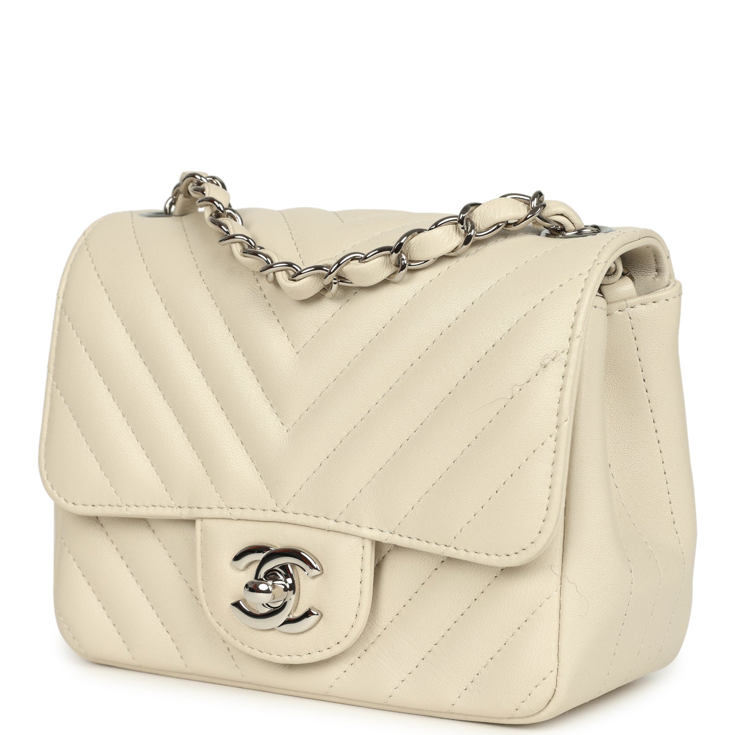 pre-owned-chanel-mini-chevron-square-flap-bag-ivory-lambskin-silver-metal