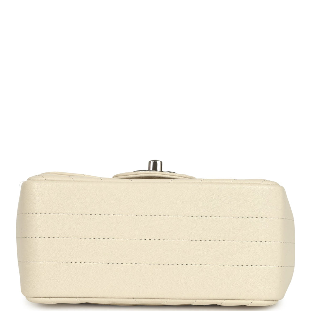 pre-owned-chanel-mini-chevron-square-flap-bag-ivory-lambskin-silver-metal