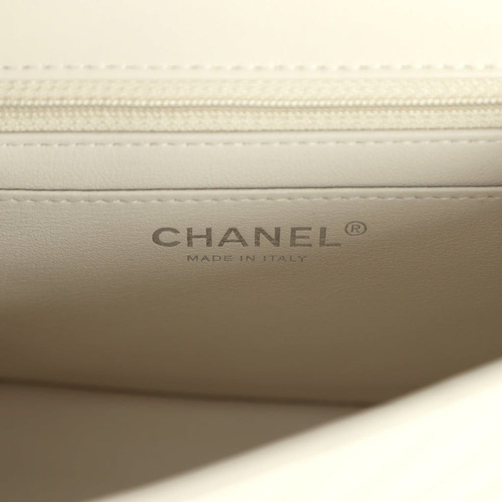 pre-owned-chanel-mini-chevron-square-flap-bag-ivory-lambskin-silver-metal