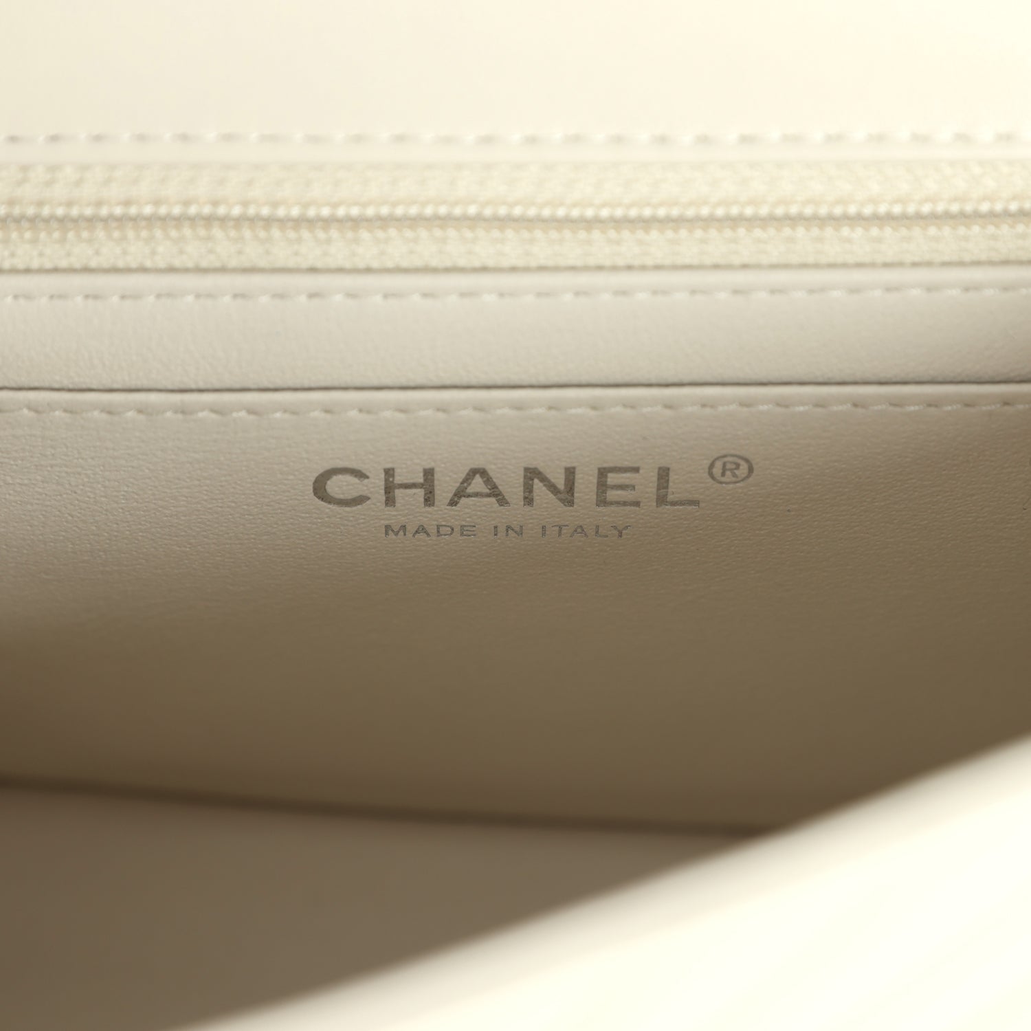 pre-owned-chanel-mini-chevron-square-flap-bag-ivory-lambskin-silver-metal