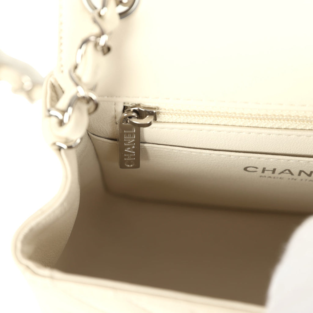 pre-owned-chanel-mini-chevron-square-flap-bag-ivory-lambskin-silver-metal