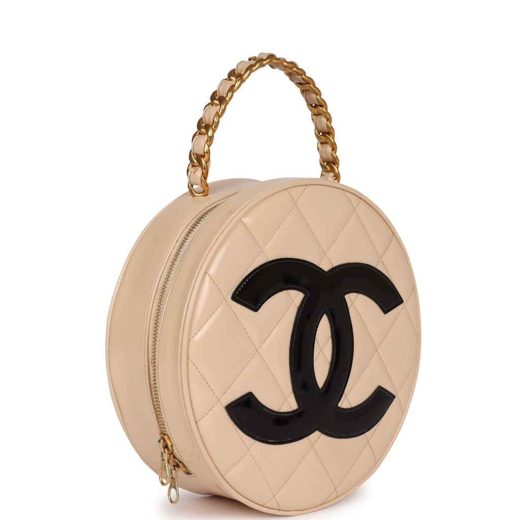 vintage-chanel-round-vanity-bag-beige-and-black-patent-leather-antique-gold-metal-1