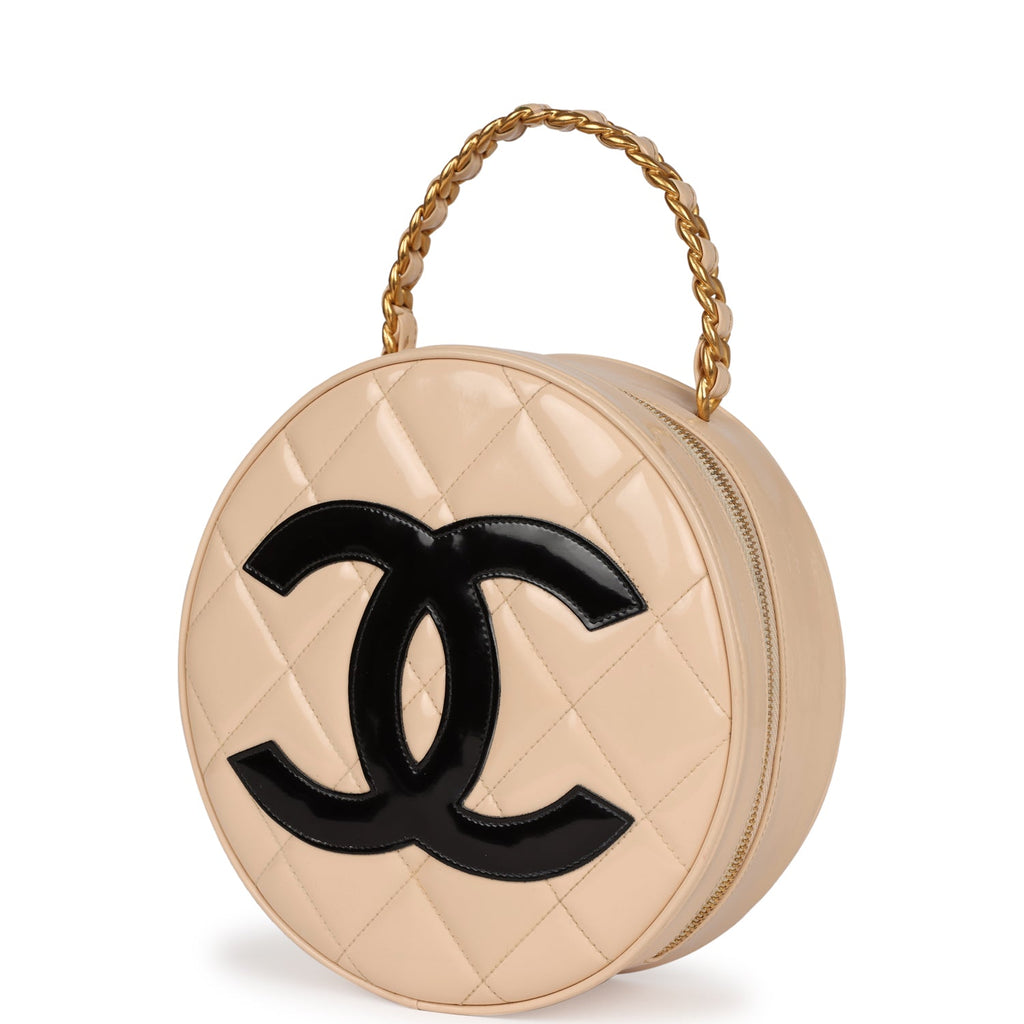 vintage-chanel-round-vanity-bag-beige-and-black-patent-leather-antique-gold-metal-1
