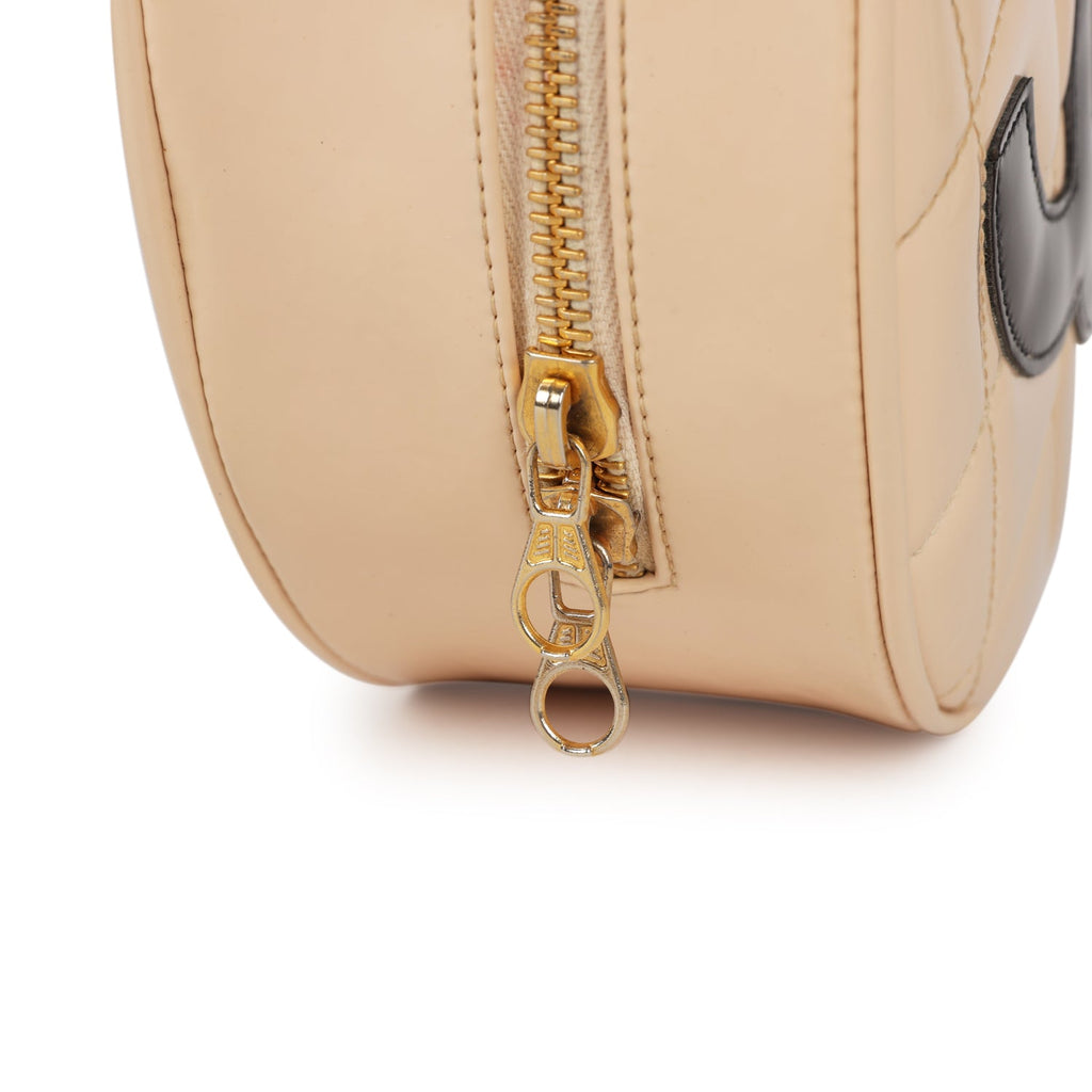 vintage-chanel-round-vanity-bag-beige-and-black-patent-leather-antique-gold-metal-1