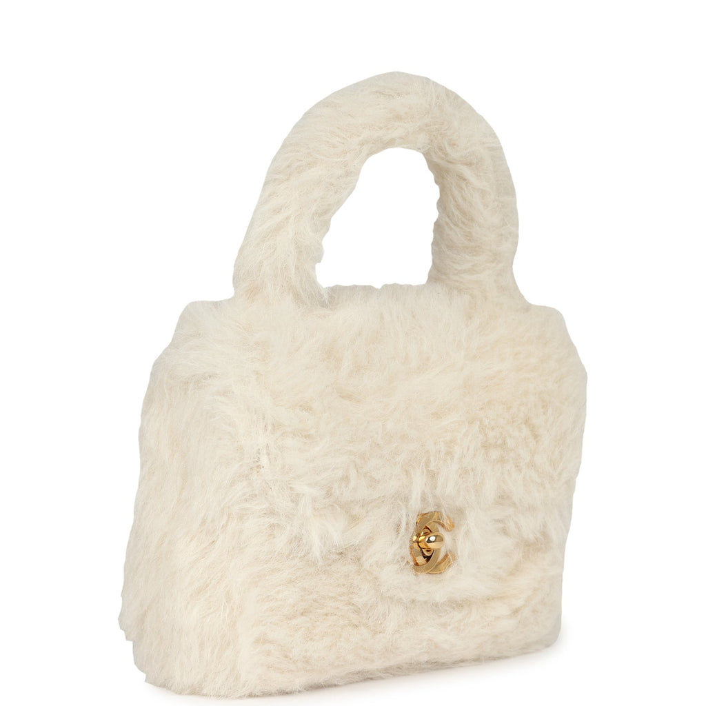 vintage-chanel-micro-kelly-child-white-rabbit-fur-gold-metal
