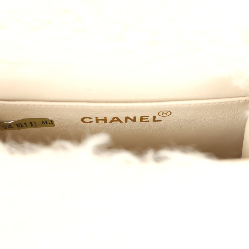 vintage-chanel-micro-kelly-child-white-rabbit-fur-gold-metal