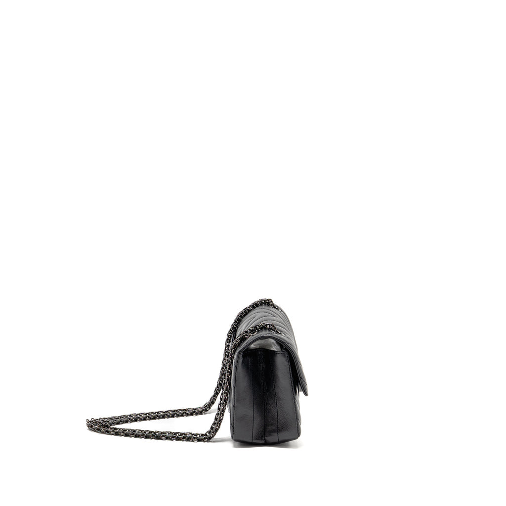 chanel-mini-2-55-reissue-flap-bag-chevron-aged-calfskin-so-black