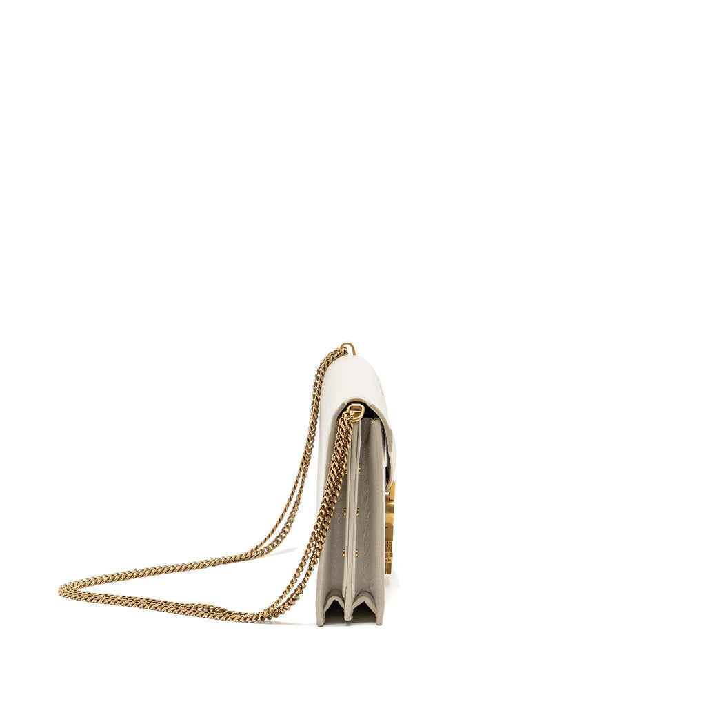 saint-laurent-ysl-cassandra-chain-wallet-grained-calfskin-creamy-white-ghw