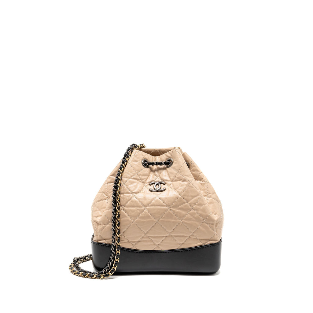 chanel-small-gabrielle-backpack-aged-calfskin-beige-black-multicolour-hardware-1