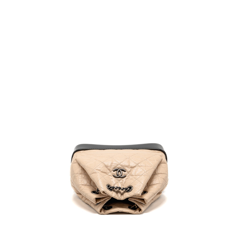 chanel-small-gabrielle-backpack-aged-calfskin-beige-black-multicolour-hardware-1