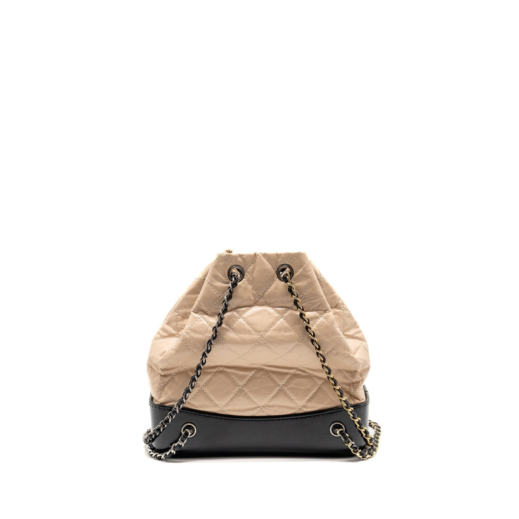 chanel-small-gabrielle-backpack-aged-calfskin-beige-black-multicolour-hardware-1