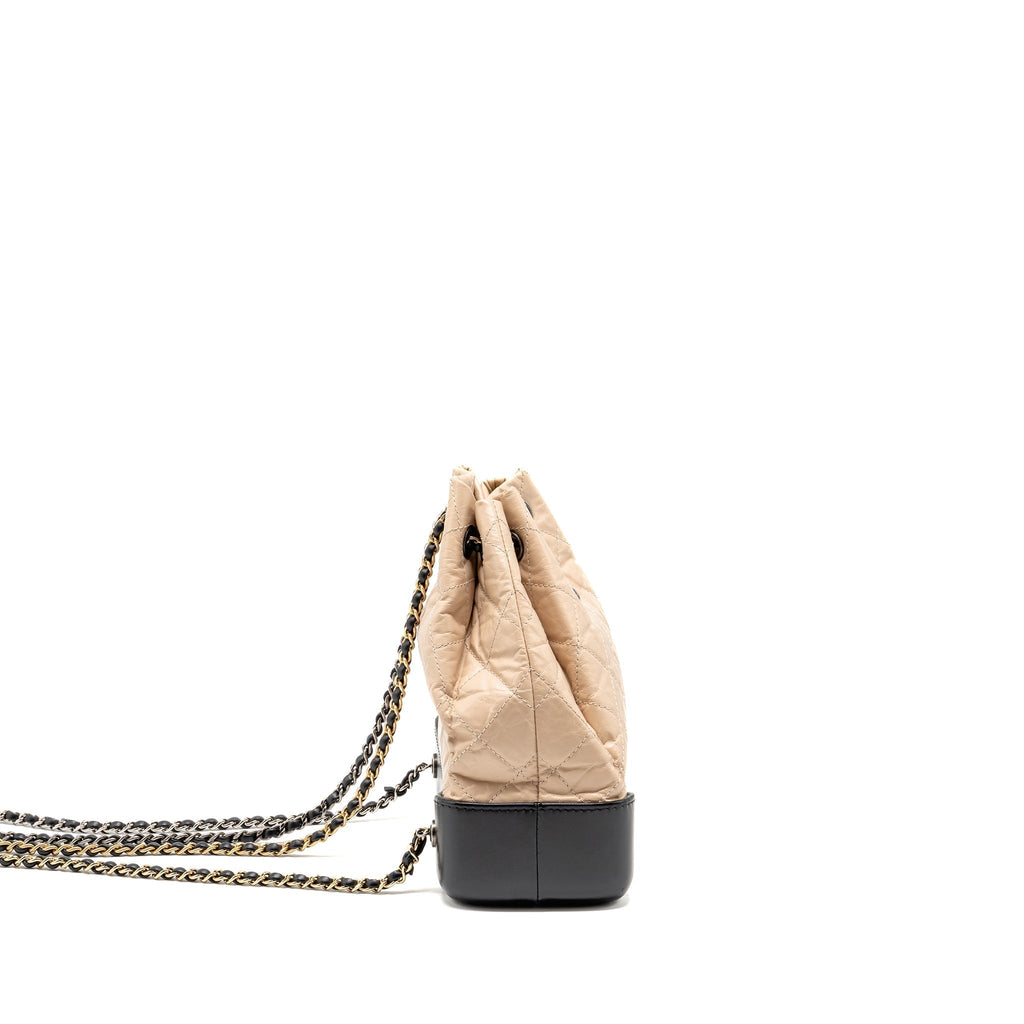 chanel-small-gabrielle-backpack-aged-calfskin-beige-black-multicolour-hardware-1