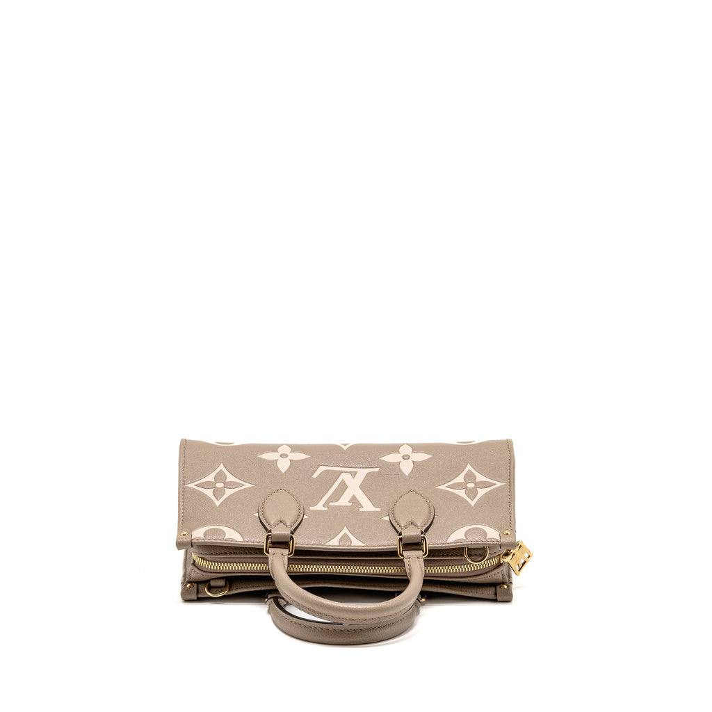 louis-vuitton-onthego-east-west-monogram-empreinte-leather-dove-cream-ghw-copy