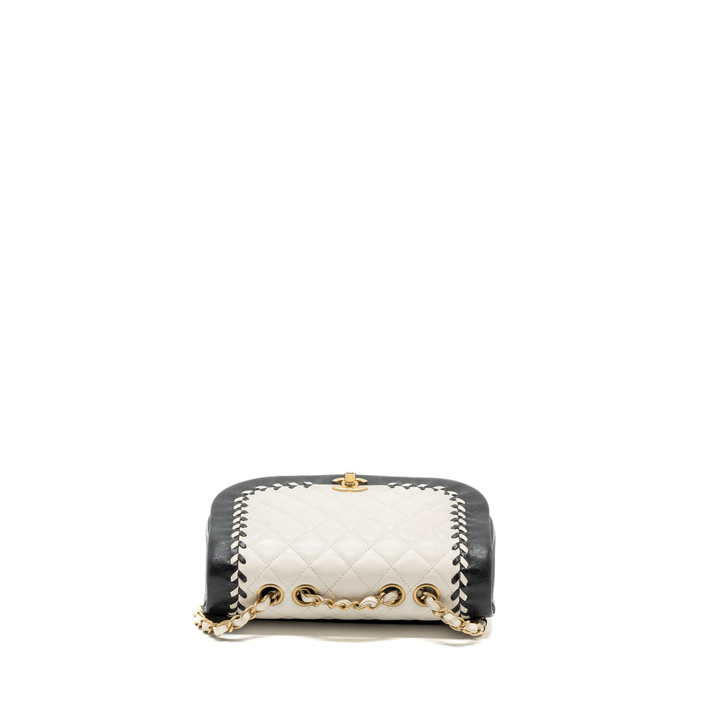 chanel-quilted-flap-bag-white-black-ghw
