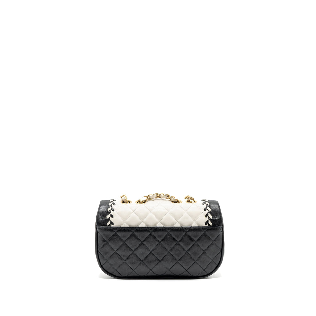 chanel-quilted-flap-bag-white-black-ghw