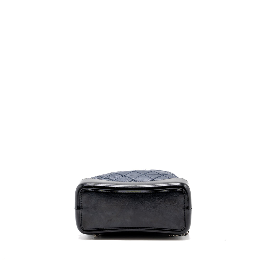 chanel-small-gabrielle-backpack-aged-calfskin-navy-blue-black-ruthenium-hardware