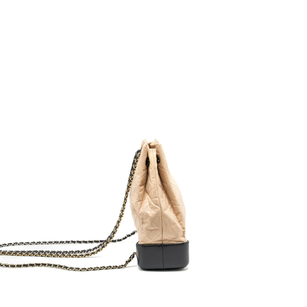 chanel-medium-gabrielle-backpack-aged-calfskin-beige-black-multicolour-hardware