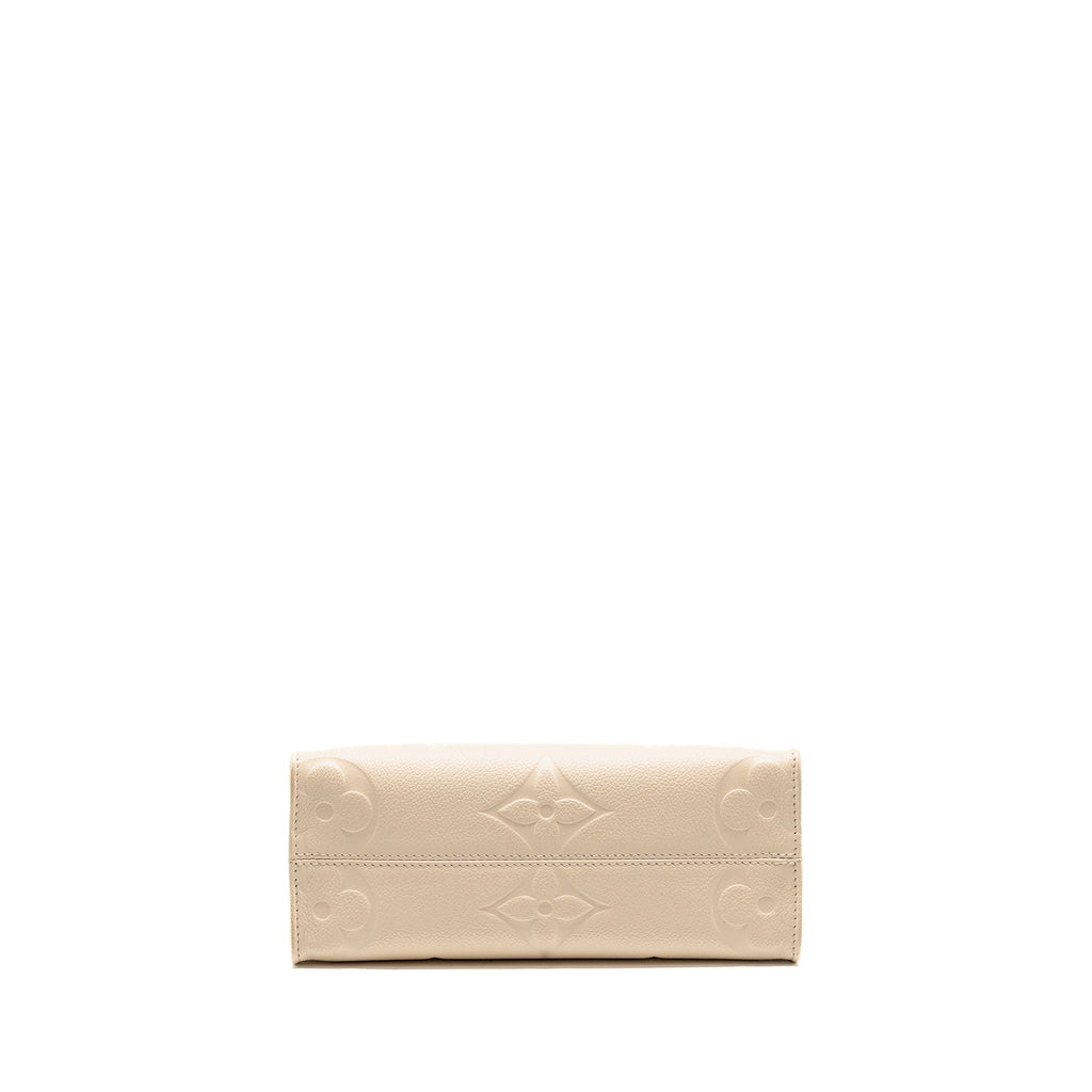 louis-vuitton-onthego-pm-monogram-empreinte-leather-creme-ghw