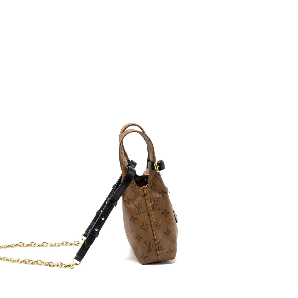 louis-vuitton-atlantis-bb-monogram-reverse-canvas-ghw