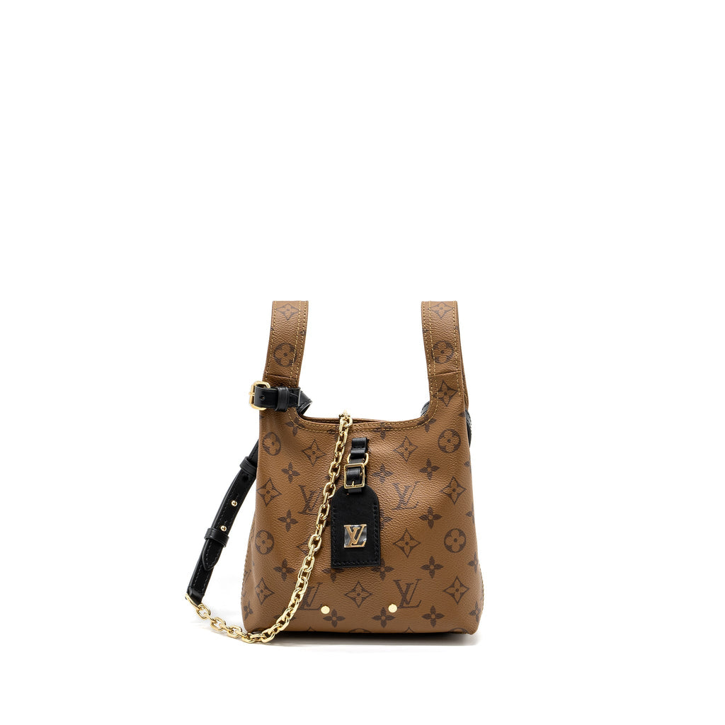 louis-vuitton-atlantis-bb-monogram-reverse-canvas-ghw