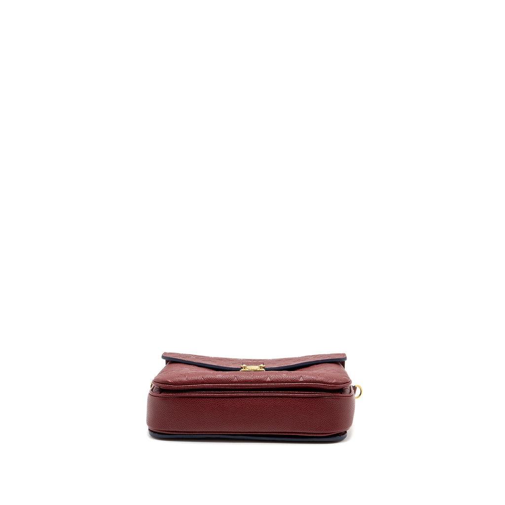 louis-vuitton-pochette-metis-monogram-empreinte-red-ghw