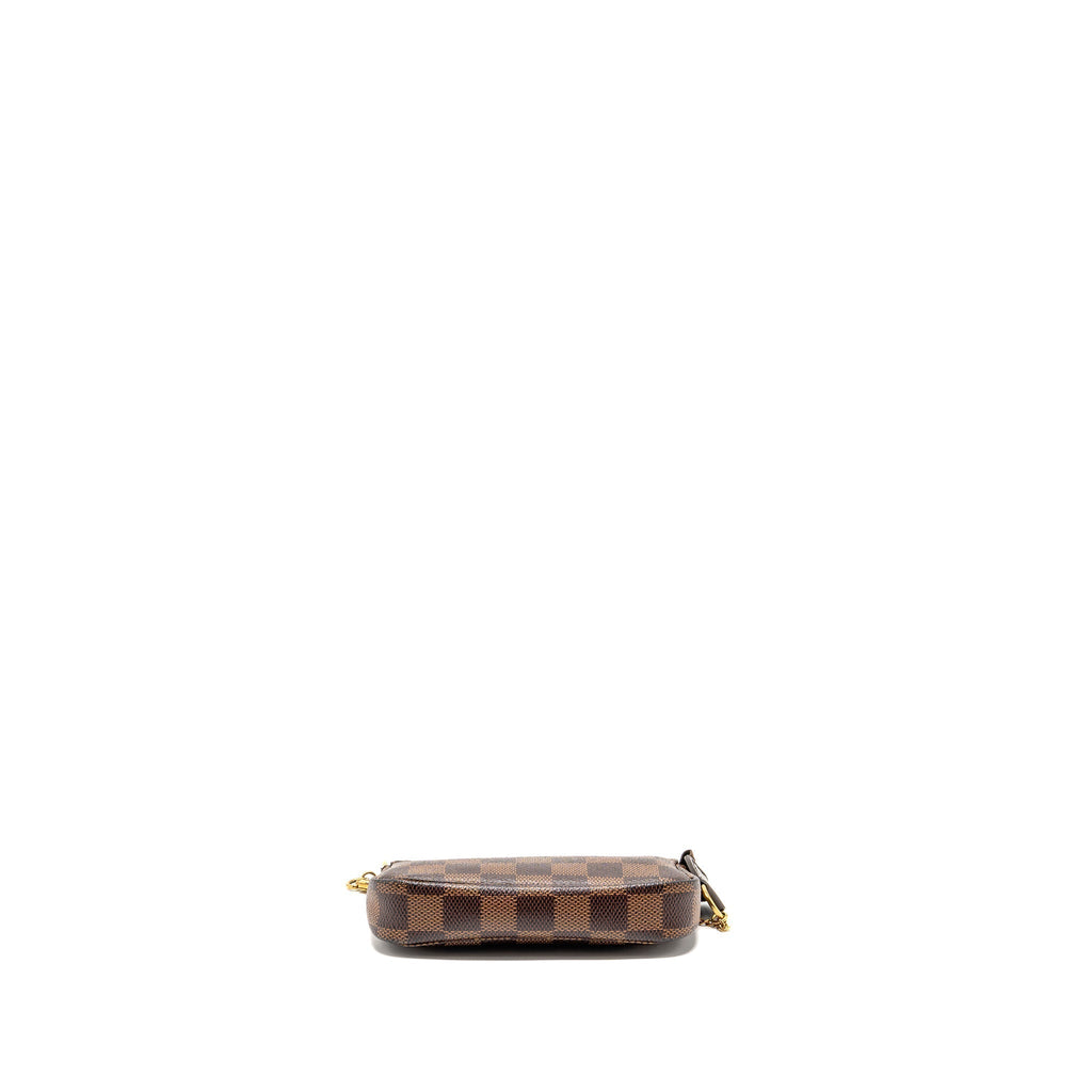 louis-vuitton-mini-pochette-accessories-damier-ebene-ghw-1