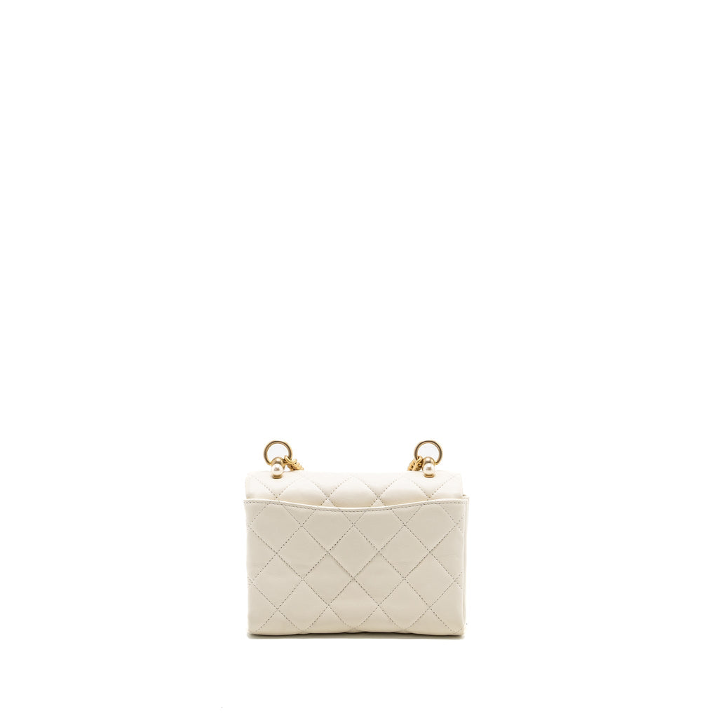 chanel-quilted-mini-flap-bag-lambskin-white-ghw