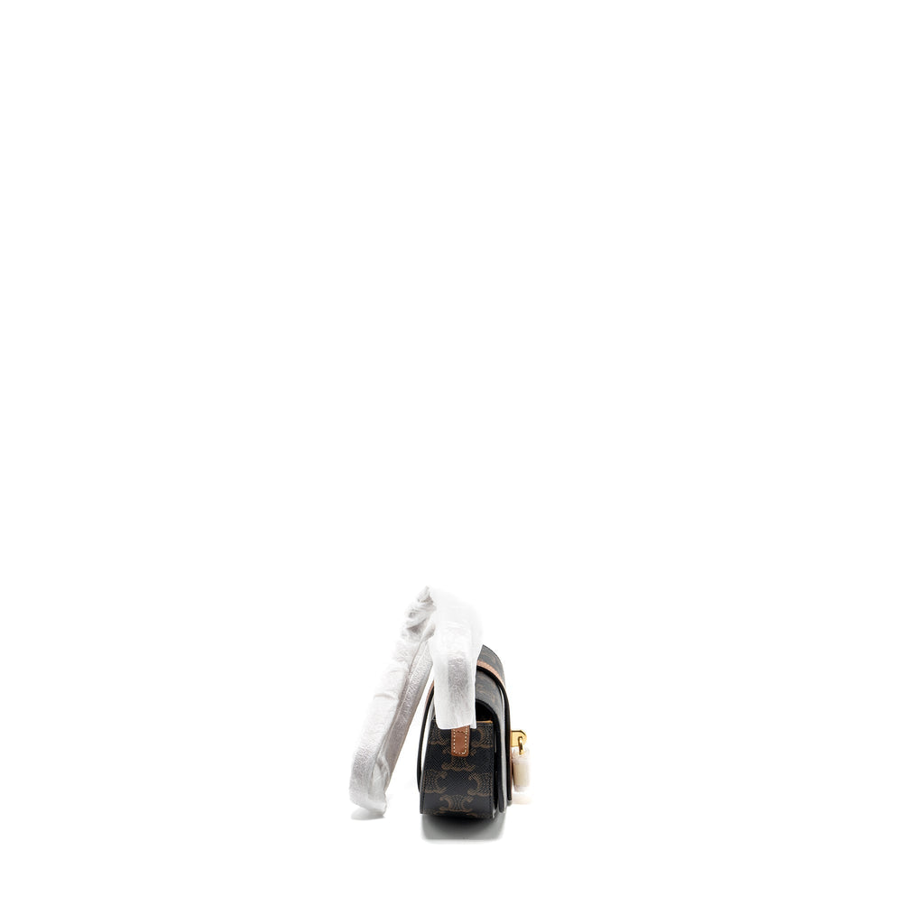 celine-clutch-on-strap-tabou-in-triomphe-canvas-calfskin-tan-ghw