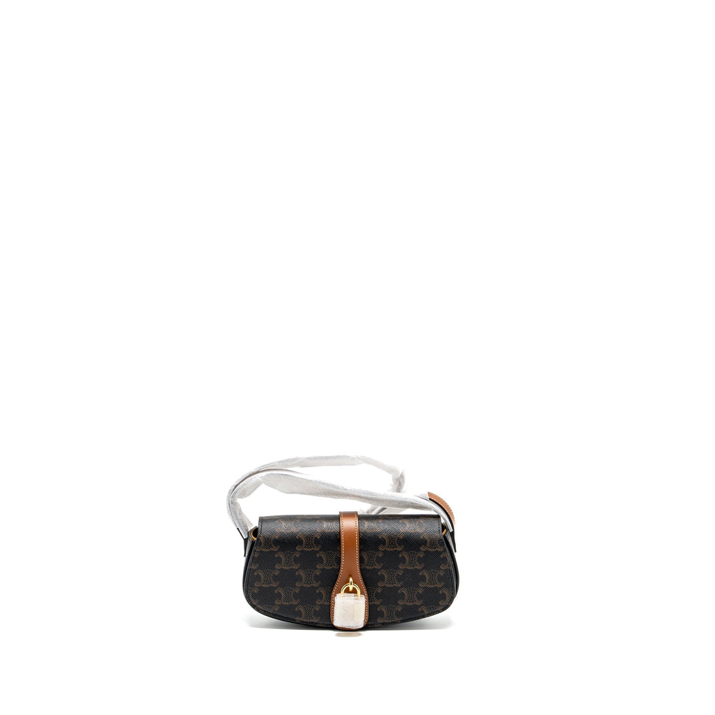 celine-clutch-on-strap-tabou-in-triomphe-canvas-calfskin-tan-ghw