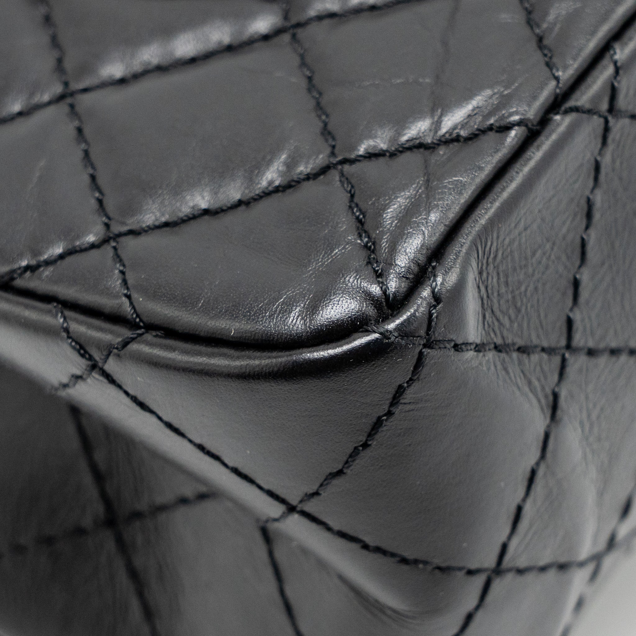 chanel-small-2-55-reissue-flap-bag-aged-calfskin-black-ghw-copy-1